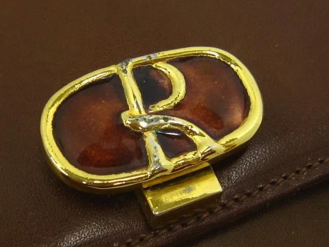 70's vintage Roberta di Camerino brown genuine leather purse with R cham chains. A rare masterpiece