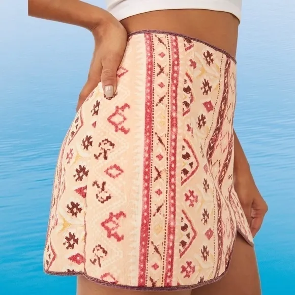 FREE PEOPLE Cleo Printed Side Slit Tie Wrap Mini Skirt in Multi Combo.