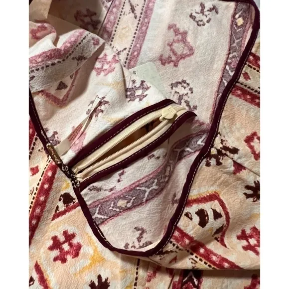 FREE PEOPLE Cleo Printed Side Slit Tie Wrap Mini Skirt in Multi Combo.