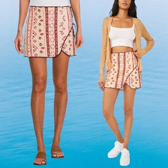 FREE PEOPLE Cleo Printed Side Slit Tie Wrap Mini Skirt in Multi Combo.