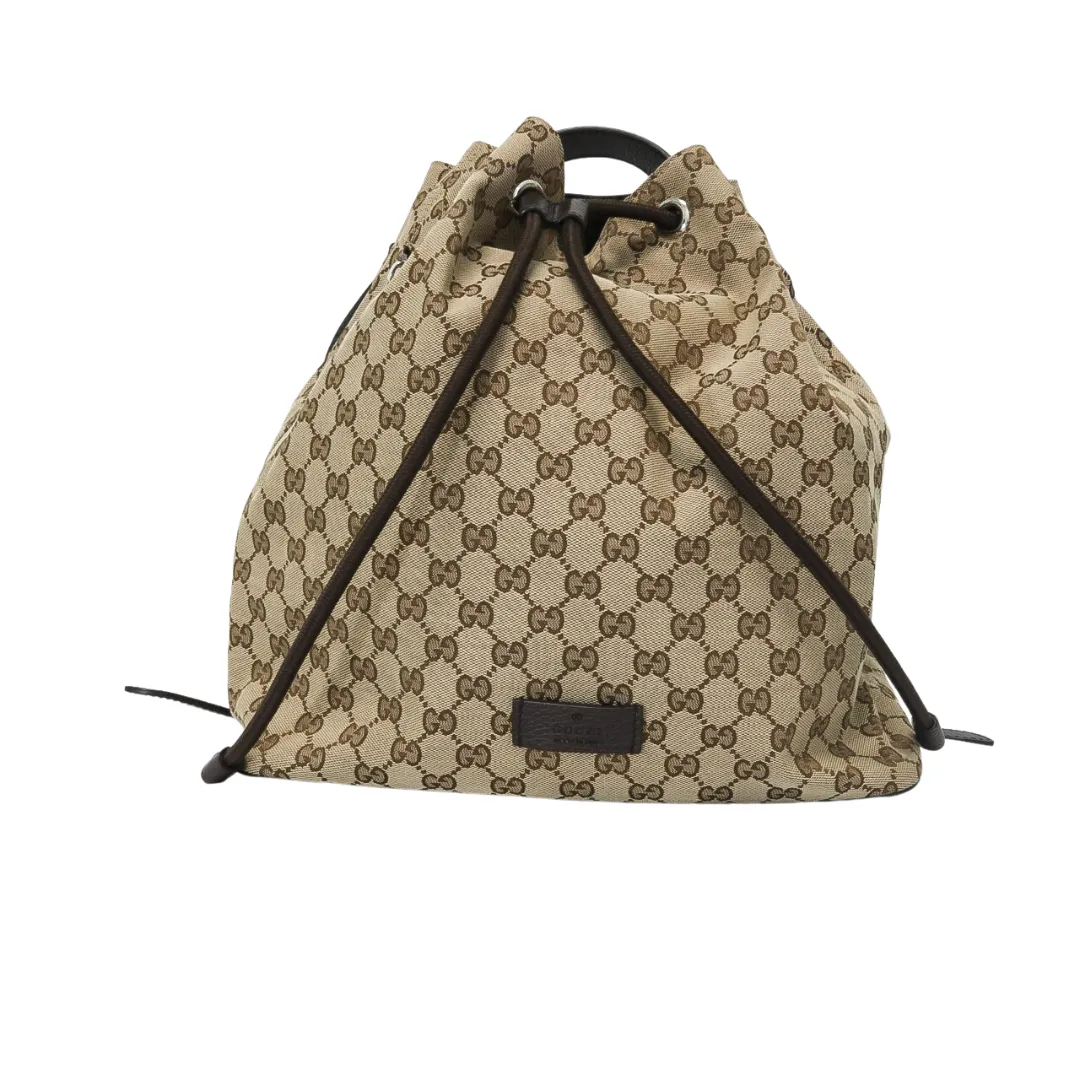 GUCCI MONOGRAM DRAWSTRING BACKPACK