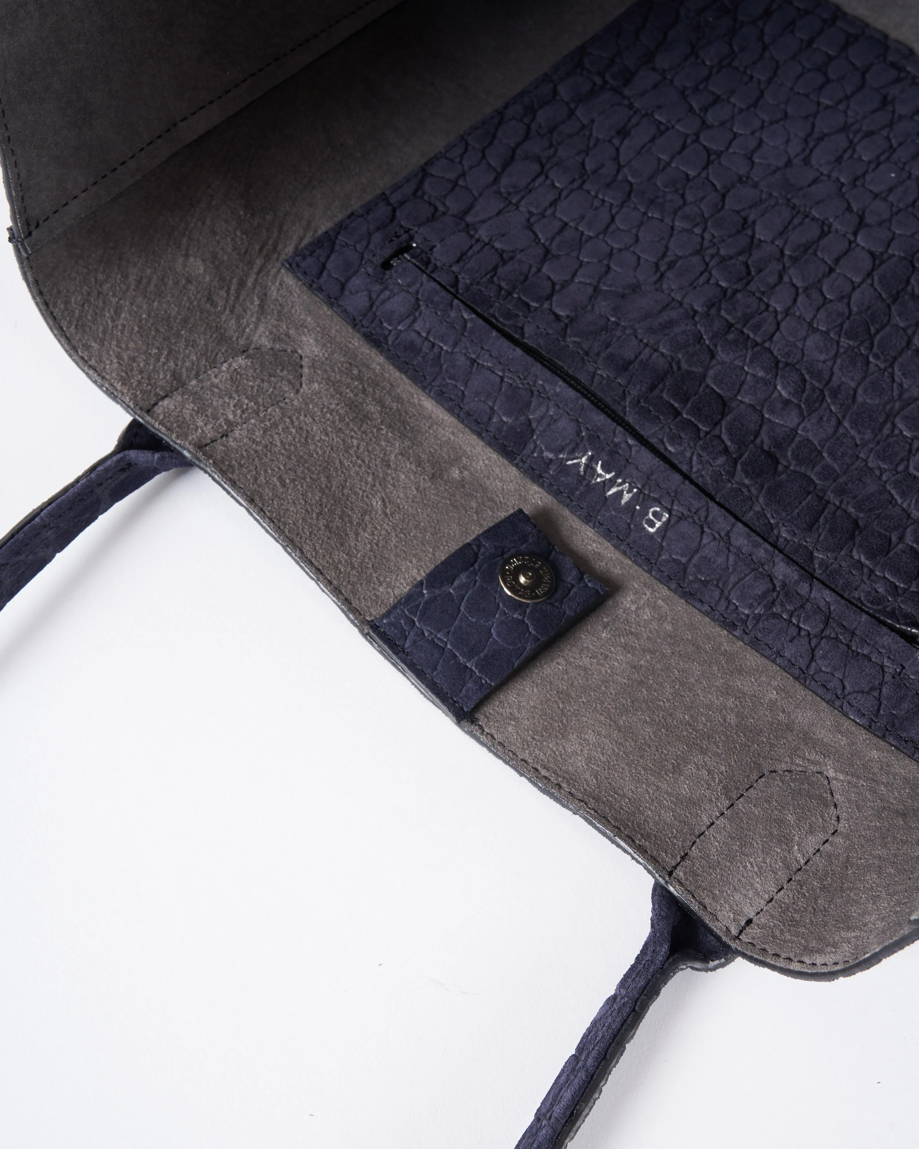 slouchy pocket tote - ink embossed suede