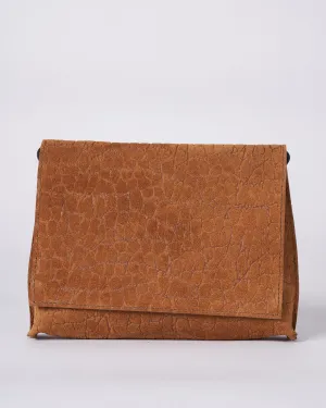 strappy foldover - tawny embossed suede w/graphite detail