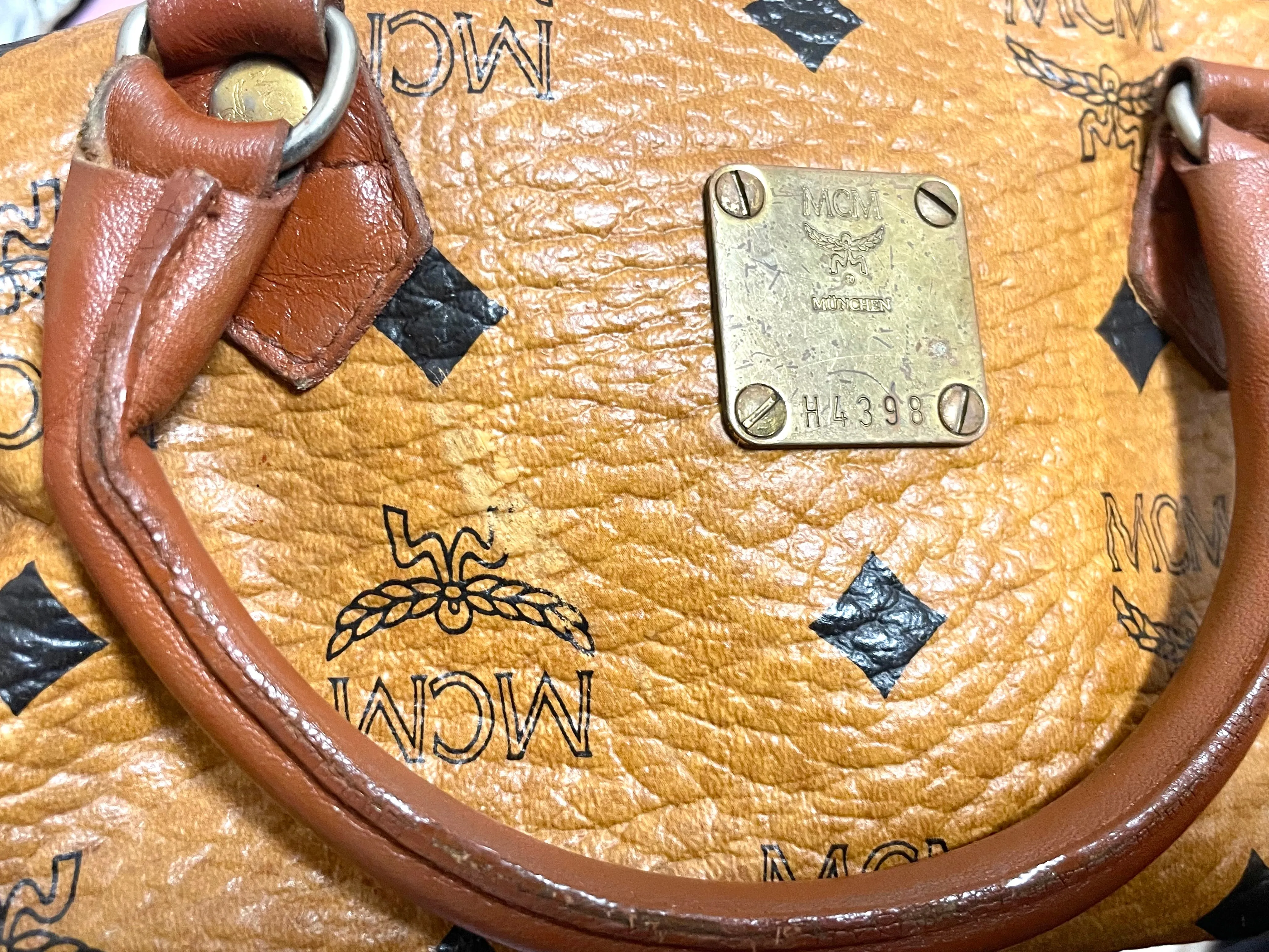 Vintage MCM classic brown monogram mini speedy bag. Must have purse, designed by Michael Cromer. 070108re1